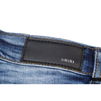 Amiri Jeans Slim Fit Stretch Ripped Jeans